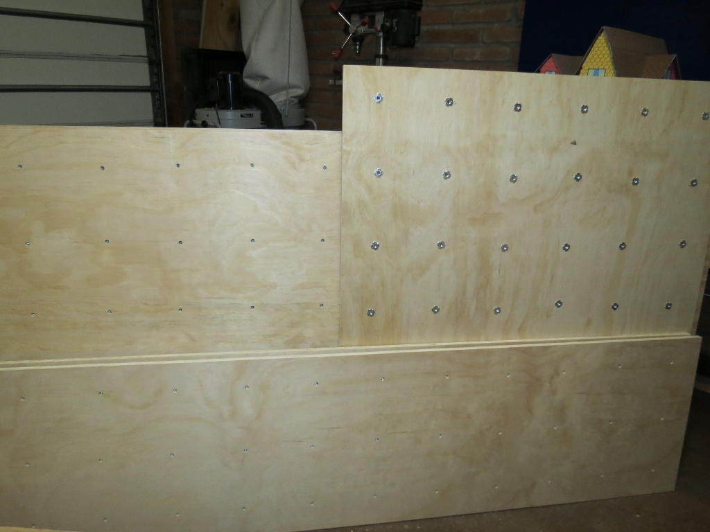 Here is what the plywood looks like on the back...holes with T nuts